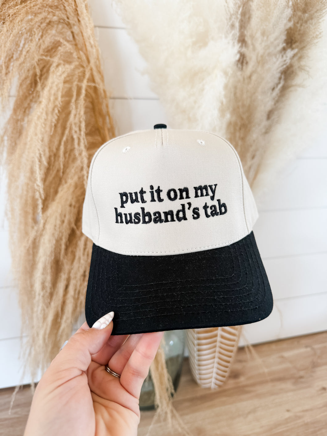 Put It On My Husband Tab Trucker Hat